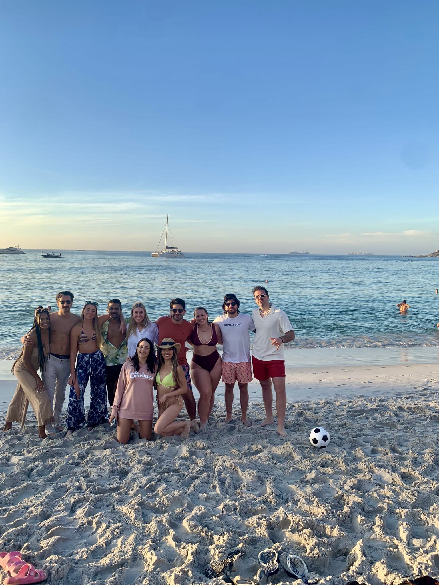 Friends on the beach at sunset